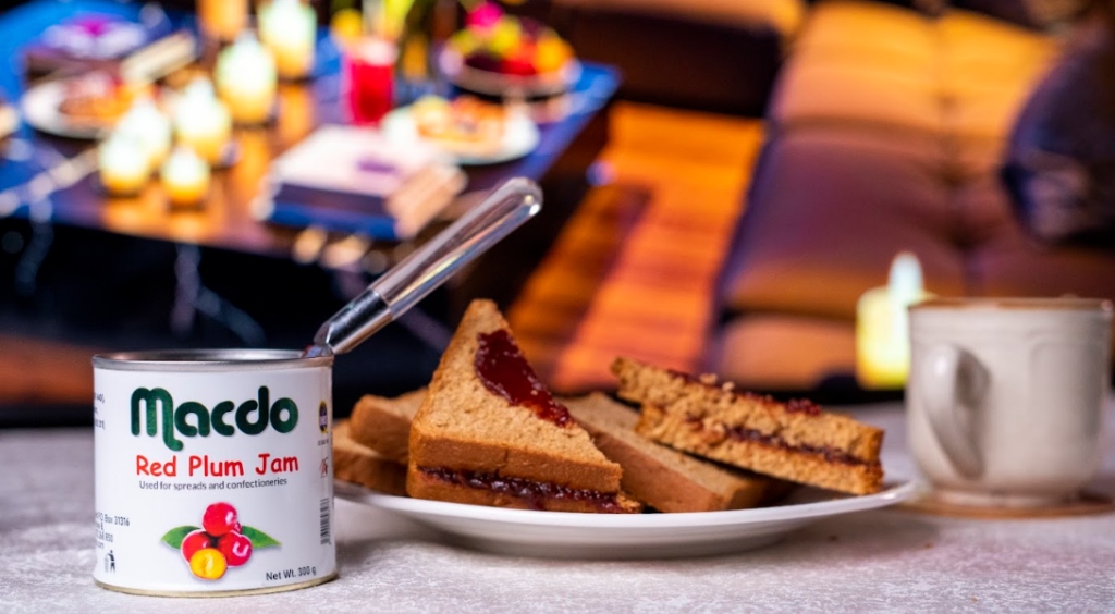 Macdo Red Plum Jam served on toast in a warm breakfast setting